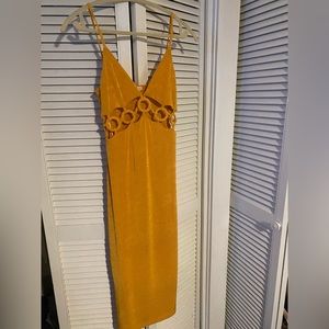 Mustard yellow, fitted, midi dress with fun cutouts, size L